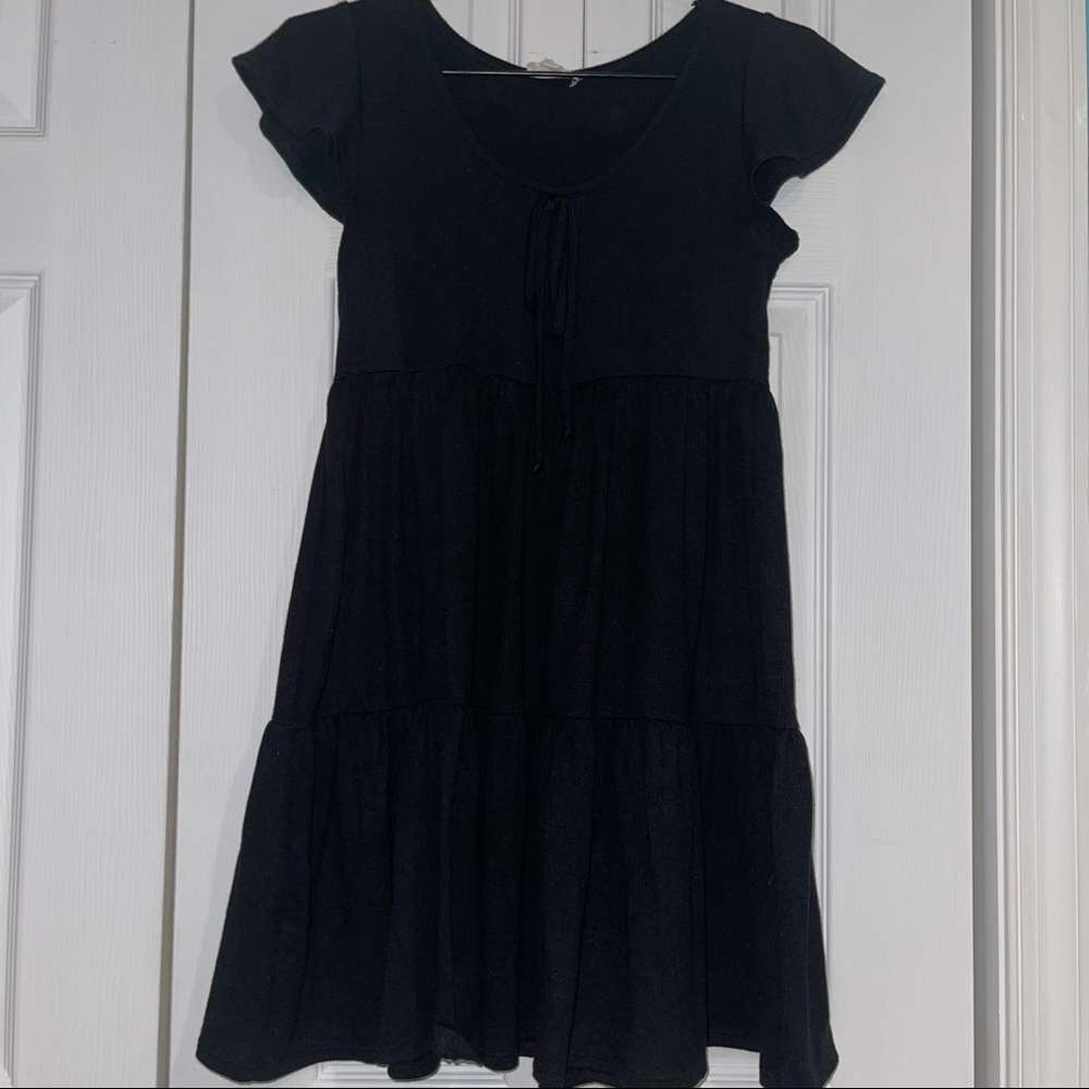 S Black Tiered Dress with flowy sleeves and tie in the center